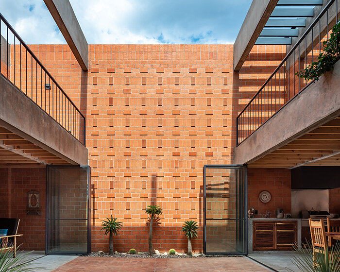 well-lit central patio blurs the boundaries within 'nuestro sueño' house in mexico