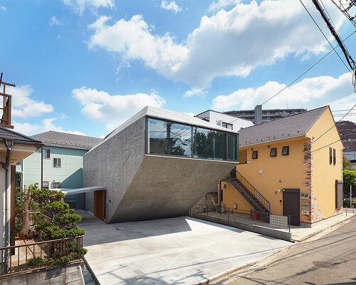 angular boulder-like house by suppose design office offers privacy from tokyo surroundings