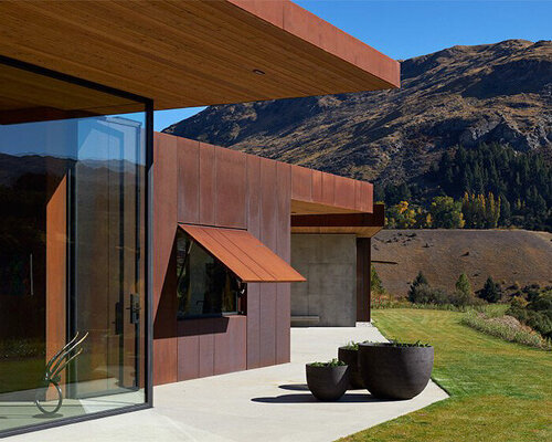 'pouaka waikura' house in rural new zealand emerges as a series of corten steel pavilions