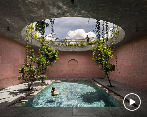 large circular roof opening punctures 23o5 studio's pink house in vietnam