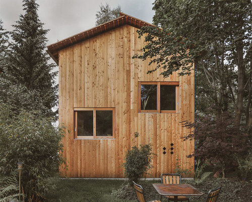 local rough larch strips clad small house + workshop in switzerland by lionel ballmer