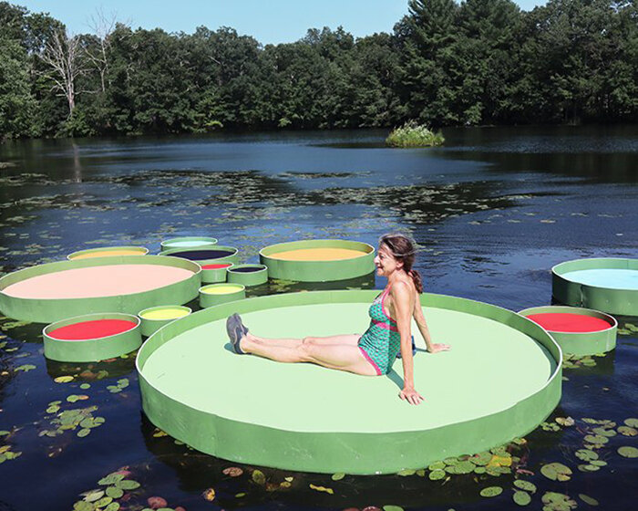 you can sit on these giant colorful lily pads in a pond in connecticut, USA