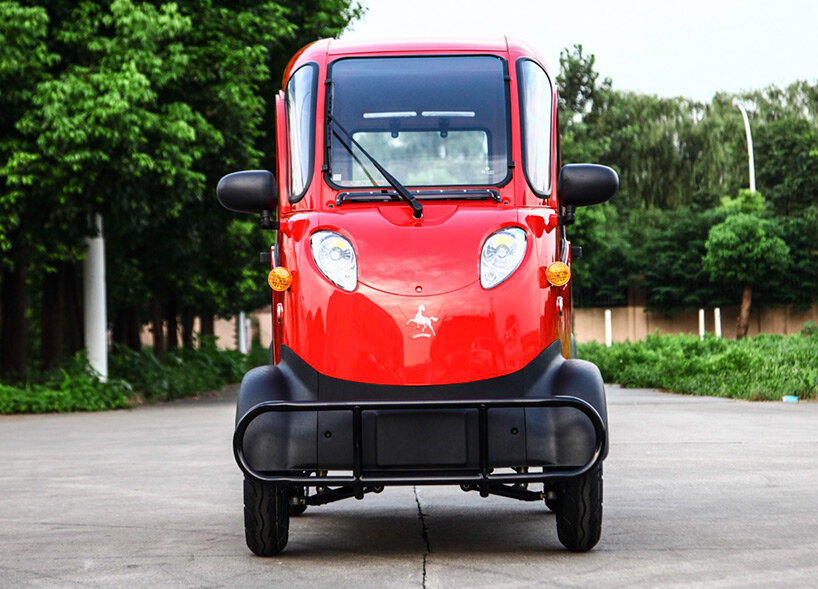 this super narrow electric car looks like an odd adult sized toy