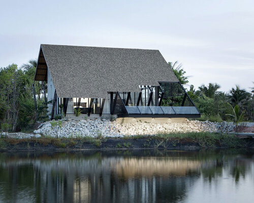 the sloping roof of TOUCH architect's 'villa backyard' directs rainwater in thailand