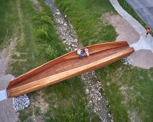 volkan alkanoglu takes cues from shipmaking to build undulating timber 'drift' bridge