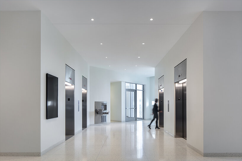 round glazed façade welcomes visitors at denver art museum's transformation