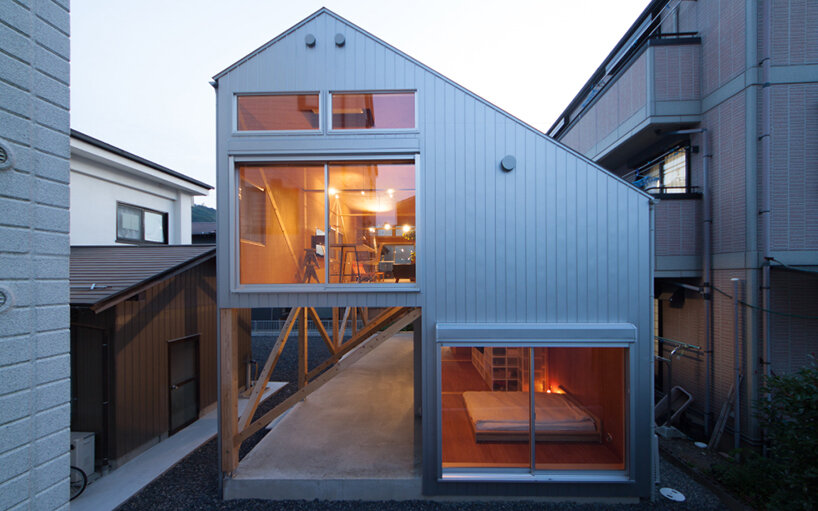 Relaxed Japanese Couple Chilling Together at Home, Using Gadgets