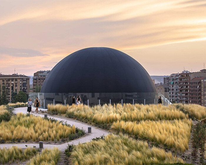 SpY reflects on the symbolism of the oculus with huge black sphere installation in spain