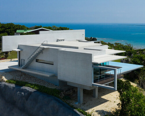 concrete hilltop villa by kidosaki architects studio overlooks the pacific ocean in japan