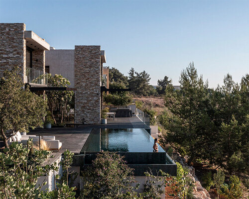 dana oberson architects completes contemporary stone villa in neve ilan, israel