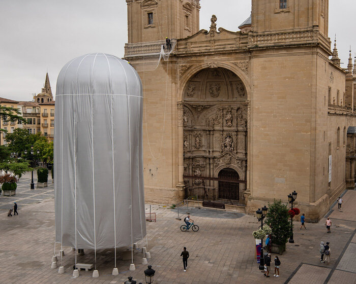 'a dome' pavilion is shaped after the monumental niche of a spanish cathedral