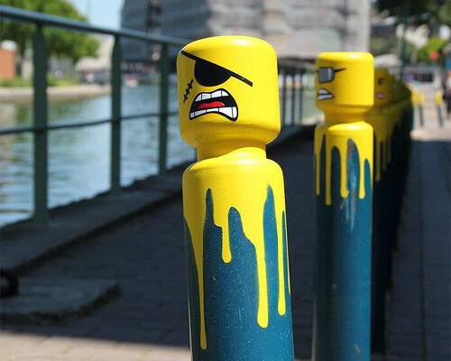 urban artist le cyklop unleashes angry one-eyed LEGOs in the streets of france