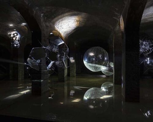 luminous sculptures hover within tomás saraceno's floating exhibition in cisternerne