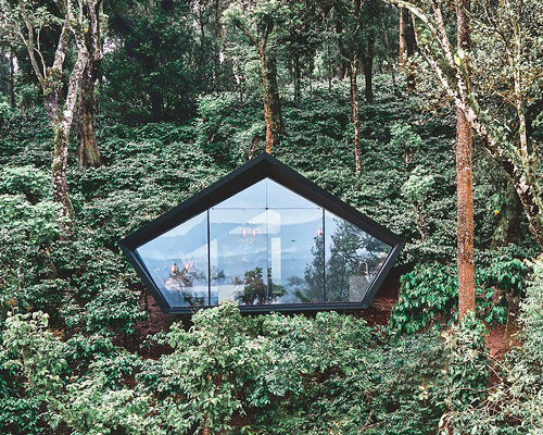 this prefabricated, 21sqm cabin features a panoramic glass façade to enjoy stunning views