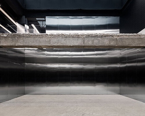 linear floating elements and reflective surfaces form this retail store in south korea