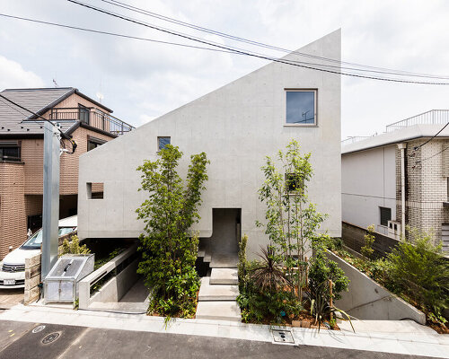 furuya design's hanegi + housing is an array of angled, floating volumes in tokyo