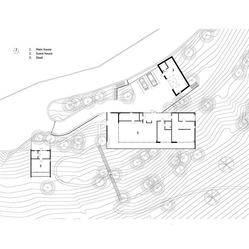 hillside house on stilts by TWO+ preserves natural surroundings