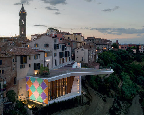 mario cucinella revives an italian hill town with cantilevered cultural center