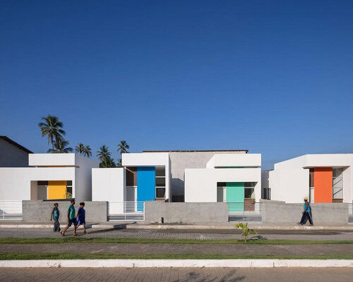 clean white geometry articulates NEBR arquitetura's social housing project in brazil