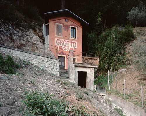 enrico sassi revives the ruinous grotto della roccia, embedded into the cliffs of switzerland