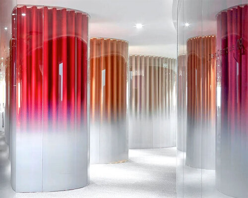 a series of glazed 'bubbles' breaks the monotony within a typical office fit-out in beijing