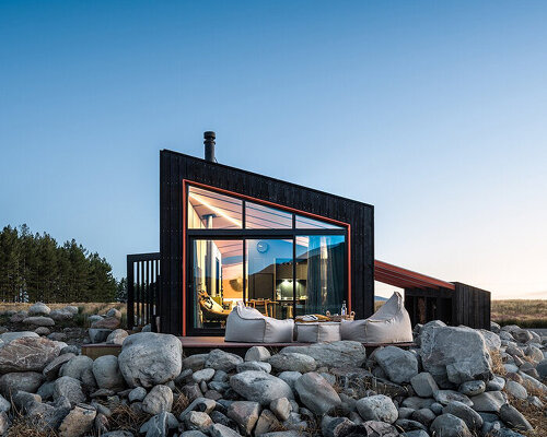 barry connor design's 50sqm cabin retreat in new zealand echoes the aerial dance of birds