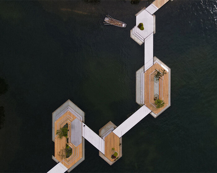 unarchitecte shapes a dynamic floating islands bridge in luxelakes water city, china