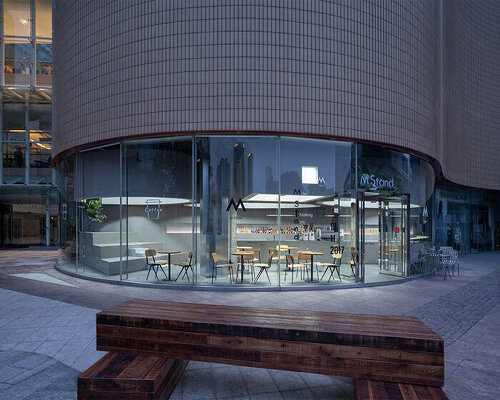 dazhou and associates (DAA) completes cylinder-shaped M stand café in shanghai