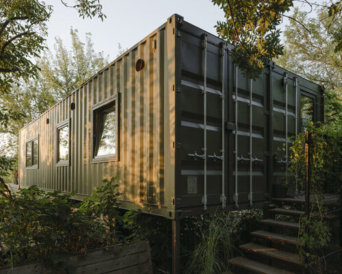 adam wiercinski joins two shipping containers to build snug home in poland