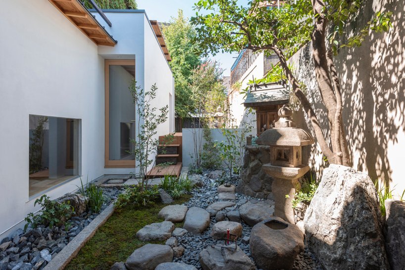 tada masaharu revitalizes 120-years-old townhouse in japan