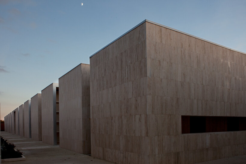 andrea dragoni completes contemplative cemetery extension in italy