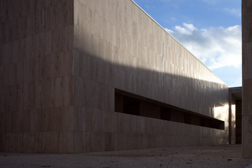 andrea dragoni completes contemplative cemetery extension in italy