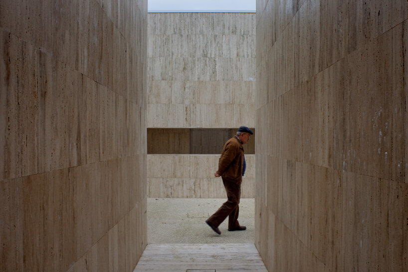 andrea dragoni completes contemplative cemetery extension in italy