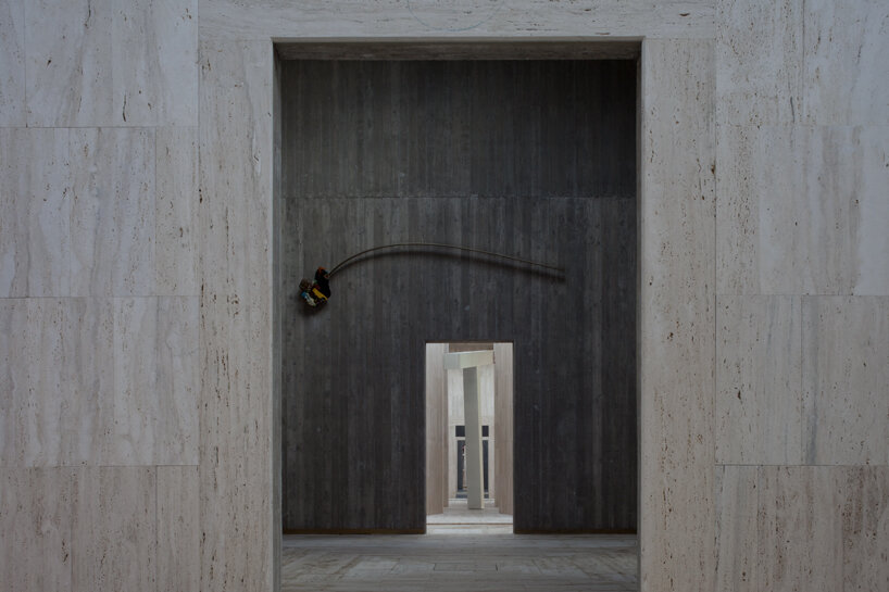 andrea dragoni completes contemplative cemetery extension in italy