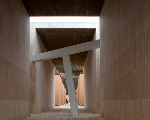 andrea dragoni completes contemplative cemetery extension in italy