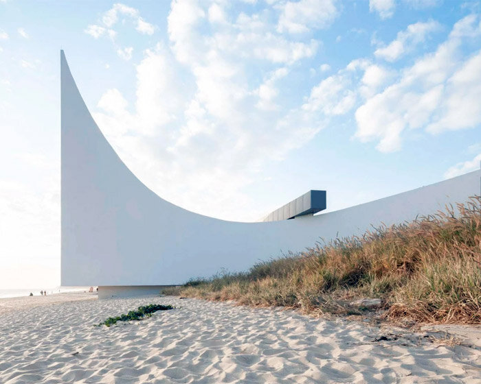 this chapel by o-office emerges as a floating pillar of light over jinting bay