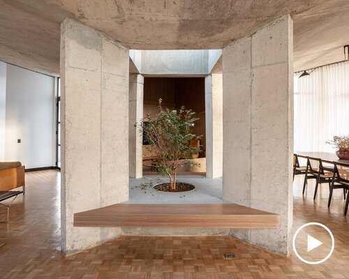 concrete pillars define movement in debaixo do bloco's brutalist 'section house' in brazil