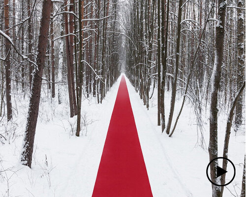 gregory orekhov rolls out 250-meter-long red carpet across snowy russian landscape