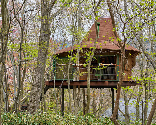 this treehouse by hiroshi nakamura & NAP architects seeks the richness of a frugal life