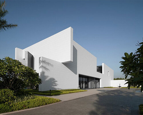 intersected white walls form geometric retail center + art gallery by aoe architects in china