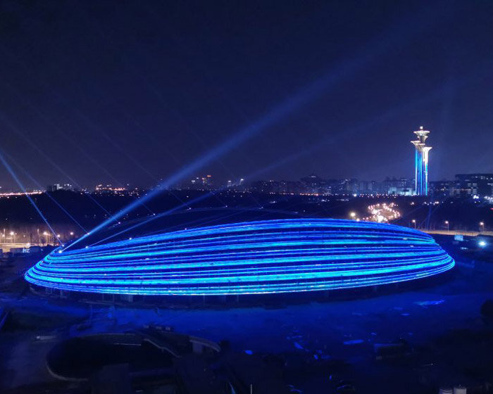 populous unveils its luminous 'ice ribbon' stadium for the 2022 winter olympics in beijing