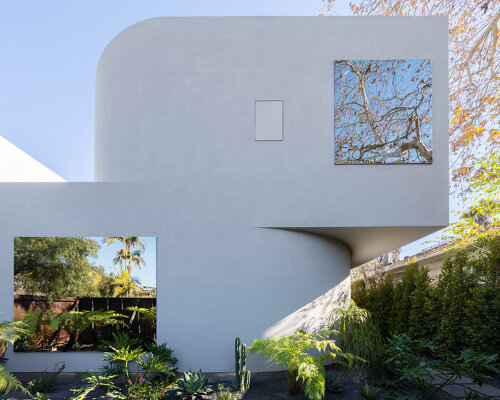 pentagon combines crisp angles with curves to shape 'radius house' in los angeles