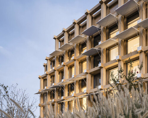 this modular building complex references traditional chinese folk houses 