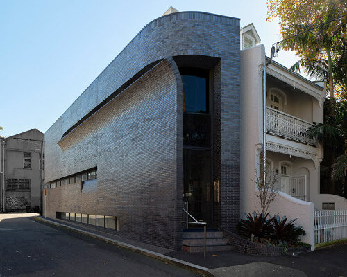 smart design studio's nickson street house takes shape with peeling brick surfaces