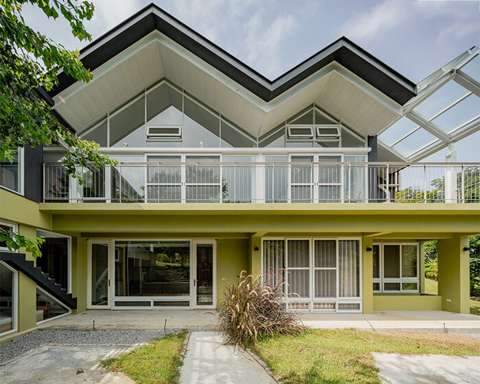 four continuous gable roofs top extroverted residence by emerge architects in taiwan