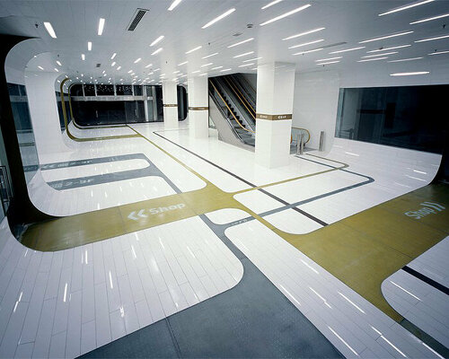 golden signs & luminous strips by A-asterisk facilitate navigation in shanghai public space