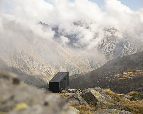 BCW collective's winning 'bivouac bredy' hut design overlooks the italian alpine valley