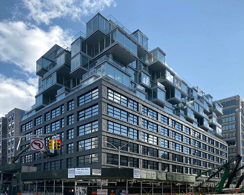 the west, a building in new york with a recycled-brick façade