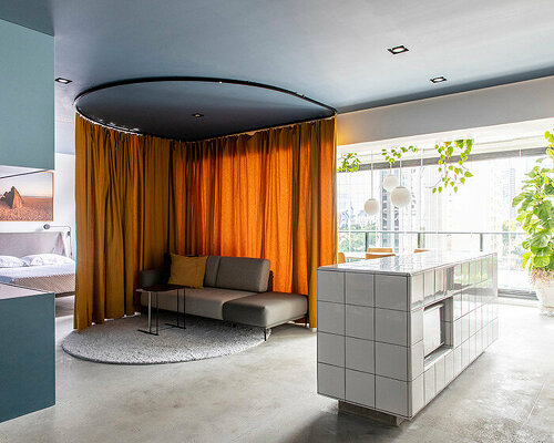 curtain partitions organize fluid apartment interior by metamoorfose studio in brazil