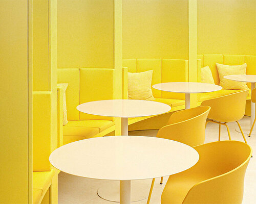 curved yellow walls define theatrical pastry shop interior by ramoprimo in beijing